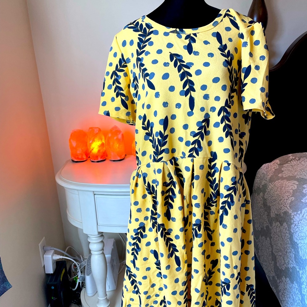 Buttery light yellow short sleeve spring or summer dress.